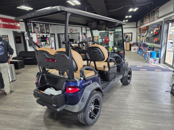 2027 Club Car Onward 4 Forward lifted lithium golf cart in Blue Onyx with four forward-facing seats